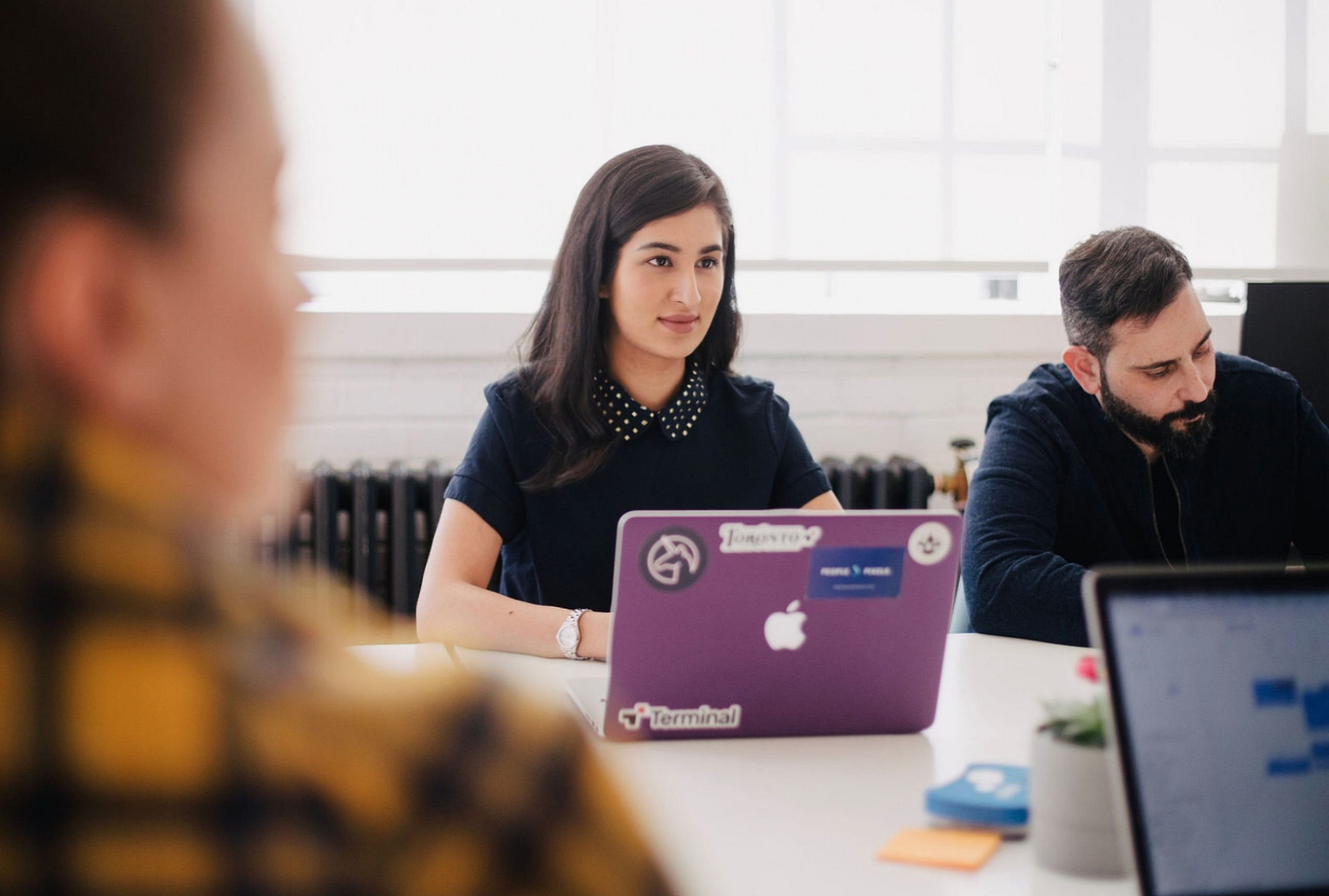 flexible working: woman in office with laptop