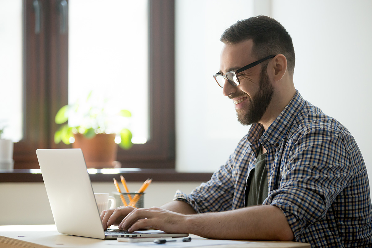 hybrid working - man working from home