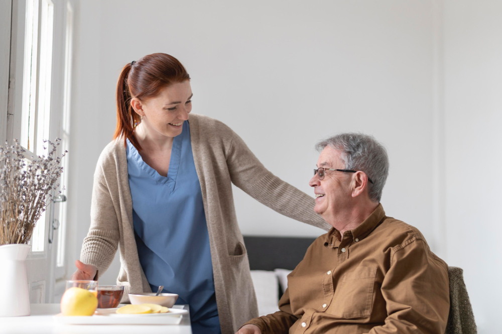 carer giving care to man